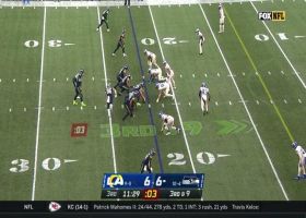 Russell Wilson improvises for key third-down floater to Carlos Hyde