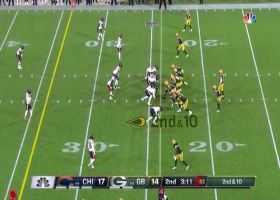 Rodgers' pump fake buys time for 20-yard throw to Marcedes Lewis