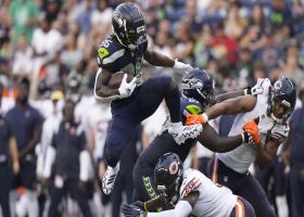 Darwin Thompson elevates over A.J. Thomas on 16-yard carry