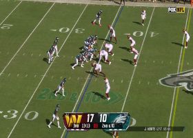 Hurts lofts 28-yard pass to A.J. Brown amid two defenders