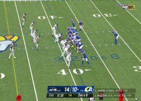 Brandon Powell takes trap-play handoff for 16-yard pickup