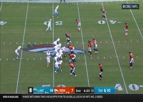 Justin Simmons pokes ball away from Ekeler for Broncos' takeaway