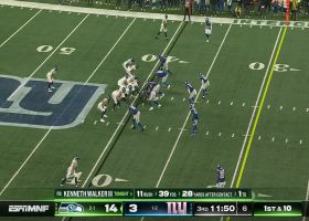 Zach Charbonnet has a wide open hole to run through for 15 yards