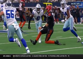 Burrow rises from ground quickly after absorbing illegal tackle by Wilson