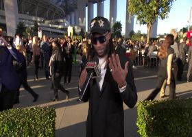 Aaron Jones shows off his outfit for NFL Honors