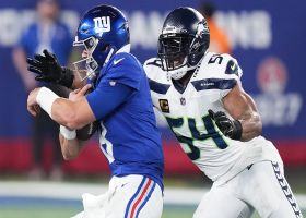 Bobby Wagner loops around the edge for a sack of Daniel Jones