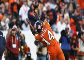 Sutton looks like Willie Mays as he catches Wilson's high-arcing 23-yard loft