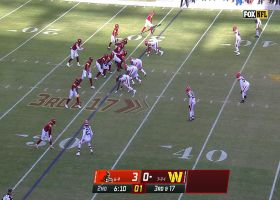 Jahan Dotson makes leaping grab in blanket coverage for 20-yard gain along sideline