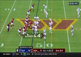 Brian Robinson Jr. slithers through Bills defense for 23-yard gain