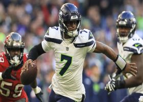 Geno Smith's back pedaling provides enough time on fourth-down conversion pass to Lockett