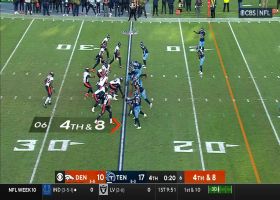 Terrance Mitchell corrals Wilson's deflected fourth-down pass to ice Titan's win