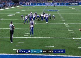 Kalif Raymond shakes off two Bills' on 41-yard punt return
