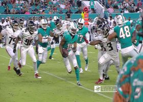 Dolphins WR Ezukama trucks Falcons DB to ground on 13-yard pickup