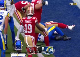 Christian McCaffrey stiff-arms defender to turf on 14-yard TD run
