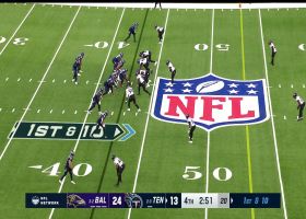 Justin Madubuike fights through a block and chases down Willis for a sack