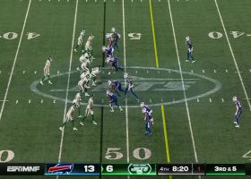 Zach Wilson barely stays upright for key 24-yard completion to Lazard