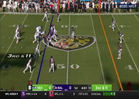 Justin Madubuike wraps up Geno Smith for sack on third down
