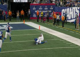 Kenneth Walker III hits the hole hard on a 31-yard run