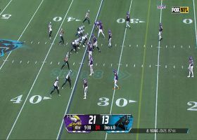 Young holds onto the ball too long as Marcus Davenport brings him down for the sack