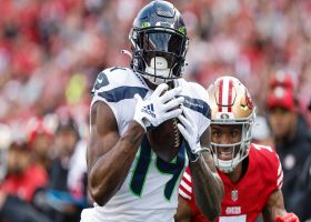 DK Metcalf juggles in 13-yard pass to convert third-and-long