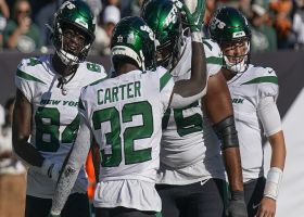 Michael Carter mimics the Waddle dance after scoring TD