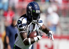 Russell Wilson rips pass to Alex Collins for 28-yard catch and run