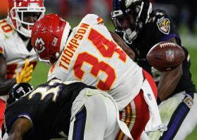 Chuck Clark jars ball from Darwin Thompson for critical Ravens turnover