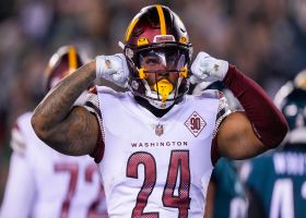 Antonio Gibson soars over line of scrimmage for pile-up TD