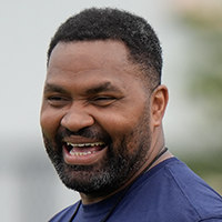 New England Patriots head coach Jerod Mayo walks on the field during NFL football practice, Wednesday, May 29, 2024, in Foxborough, Mass. (AP Photo/Steven Senne)