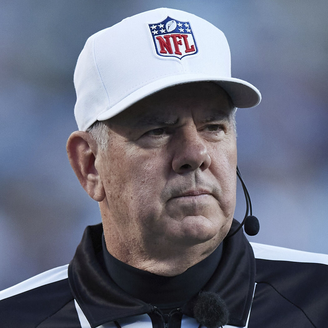 Referee Bill Vinovich (52) at work during an NFL football game between the Indianapolis Colts and the Carolina Panthers, Sunday, Nov. 5, 2023, in Charlotte, N.C. (AP Photo/Brian Westerholt)