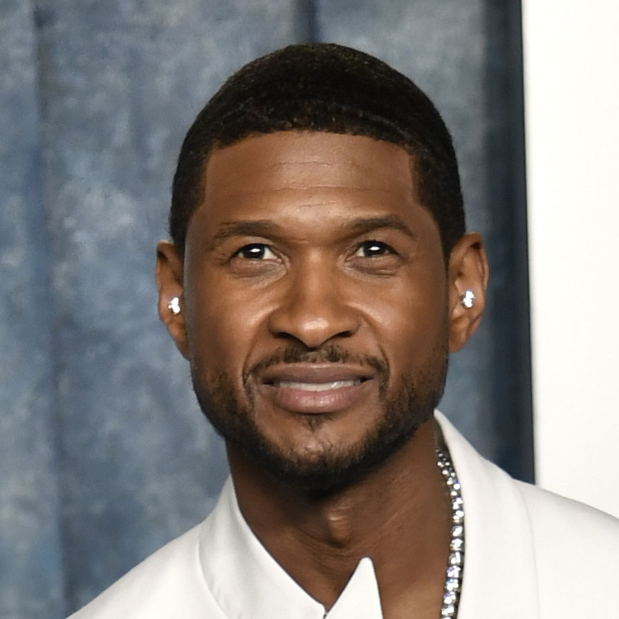 FILE - Usher arrives at the Vanity Fair Oscar Party on Sunday, March 12, 2023, at the Wallis Annenberg Center for the Performing Arts in Beverly Hills, Calif. The NFL, Apple Music and Roc Nation announced Sunday that Usher will headline the 2024 Super Bowl on Feb. 11 at Allegiant Stadium. The music megastar, who has won eight Grammys, said he's looking forward to performing on the NFL's biggest stage. (Photo by Evan Agostini/Invision/AP, File)