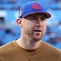 Buffalo Bills interim offensive coordinator Joe Brady, center, participates in warmups before the team's NFL football game against the New York Jets in Orchard Park, N.Y., Sunday, Nov. 19, 2023. (AP Photo/Jeffrey T. Barnes )
