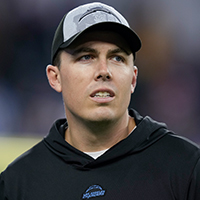 Los Angeles Chargers offensive coordinator Kellen Moore walks on the field before an NFL football game against the Buffalo Bills, Saturday, Dec. 23, 2023, in Inglewood, Calif. (AP Photo/Ryan Sun)