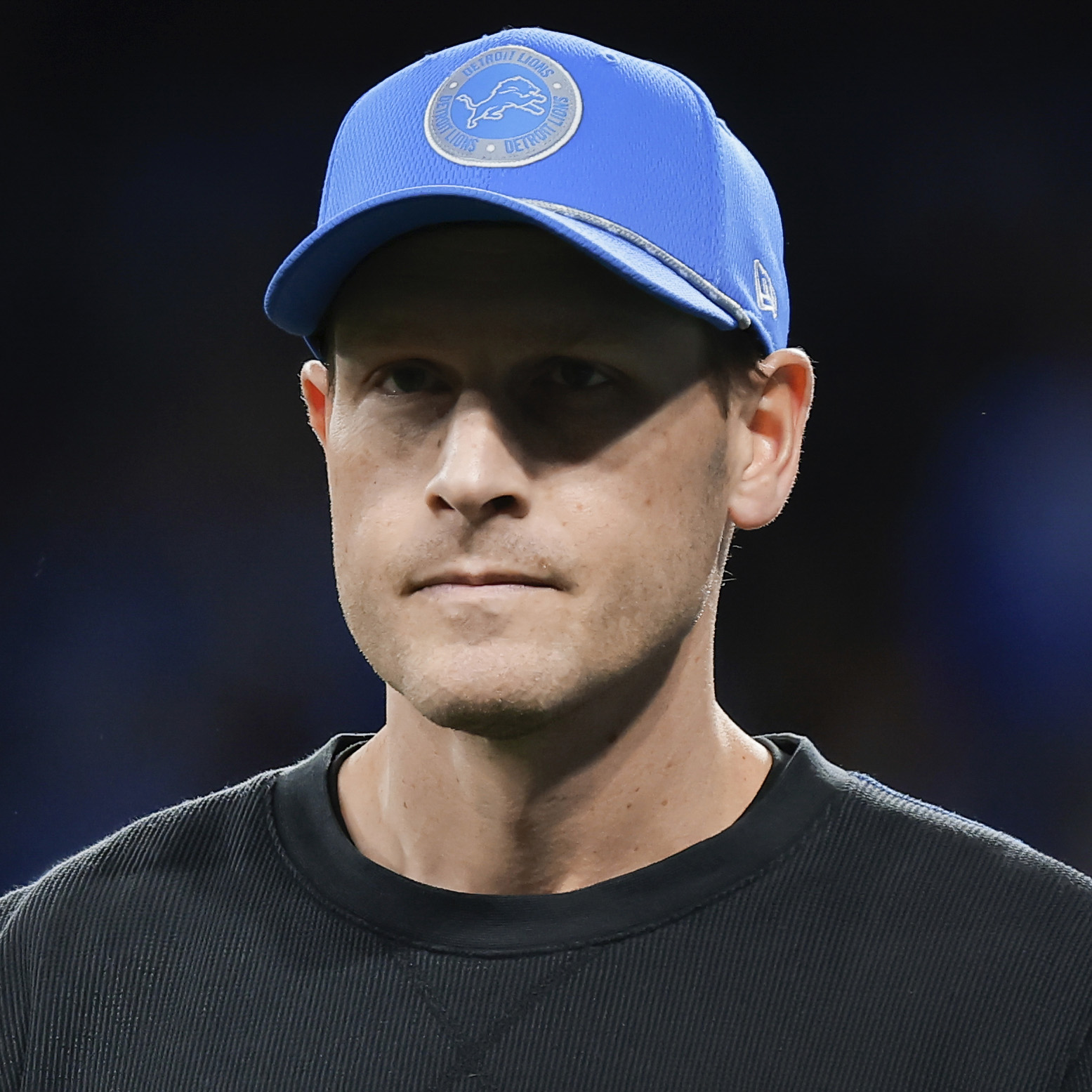 Detroit Lions offensive coordinator Ben Johnson watches during warmups before an NFL football divisional playoff game against the Washington Commanders, Saturday, Jan. 18, 2025, in Detroit. (AP Photo/Rey Del Rio)
