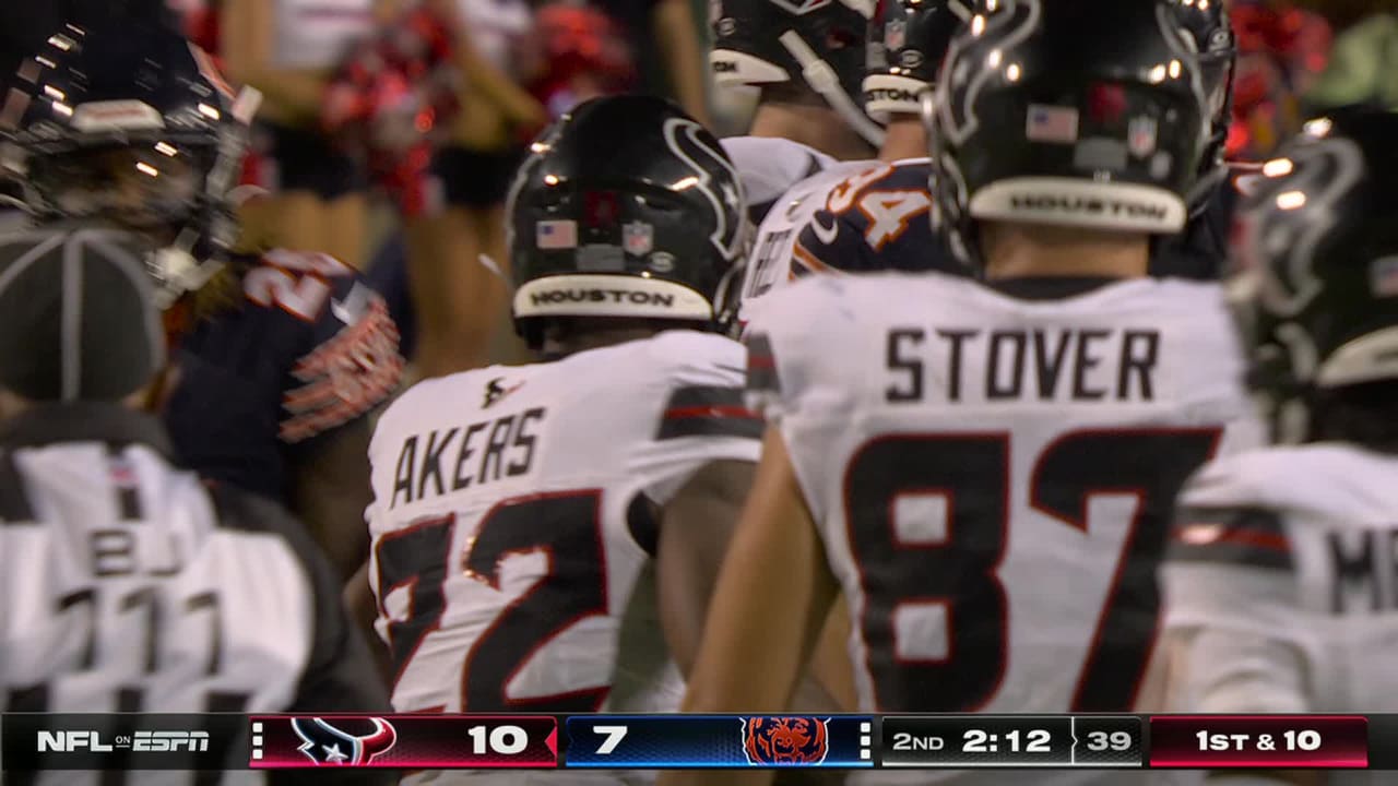 Houston Texans running back Cam Akers spins through a tackler on an ...