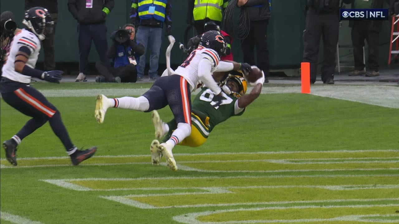 Chicago Bears defensive back Tyrique Stevenson punches out ball to deny