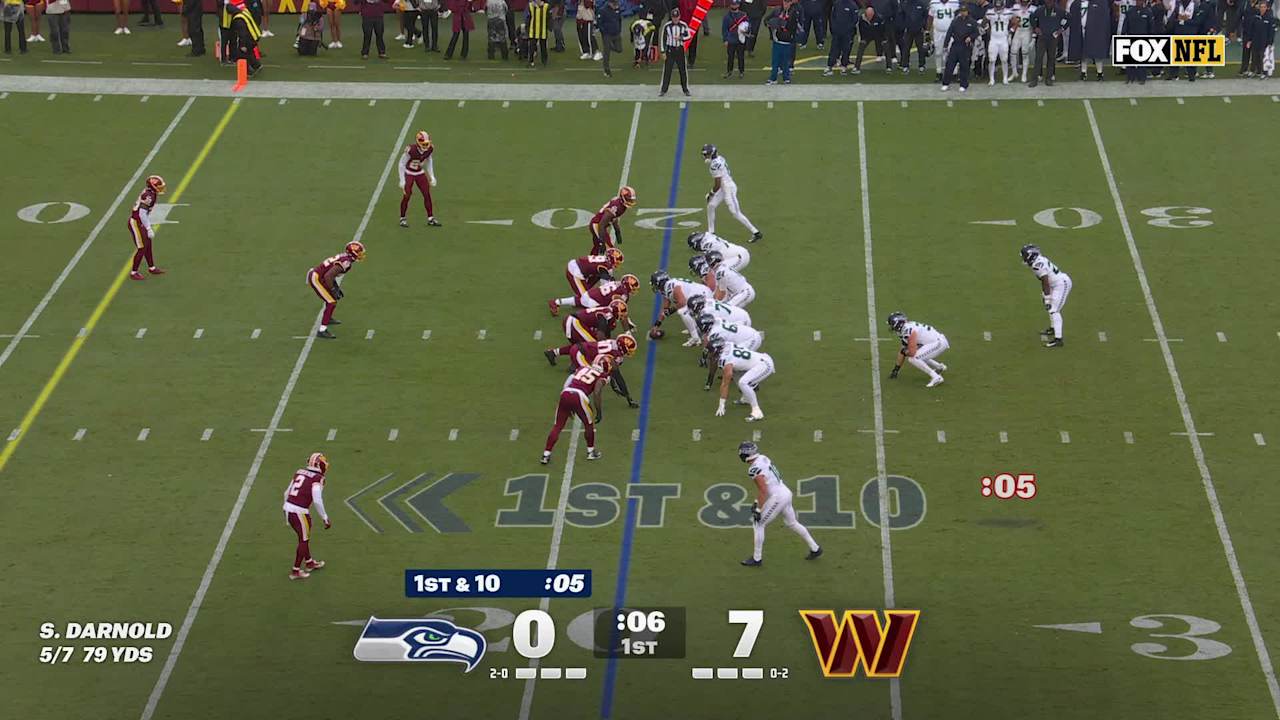 Seattle Seahawks quarterback Sam Darnold's delivery to fullback Brady ...
