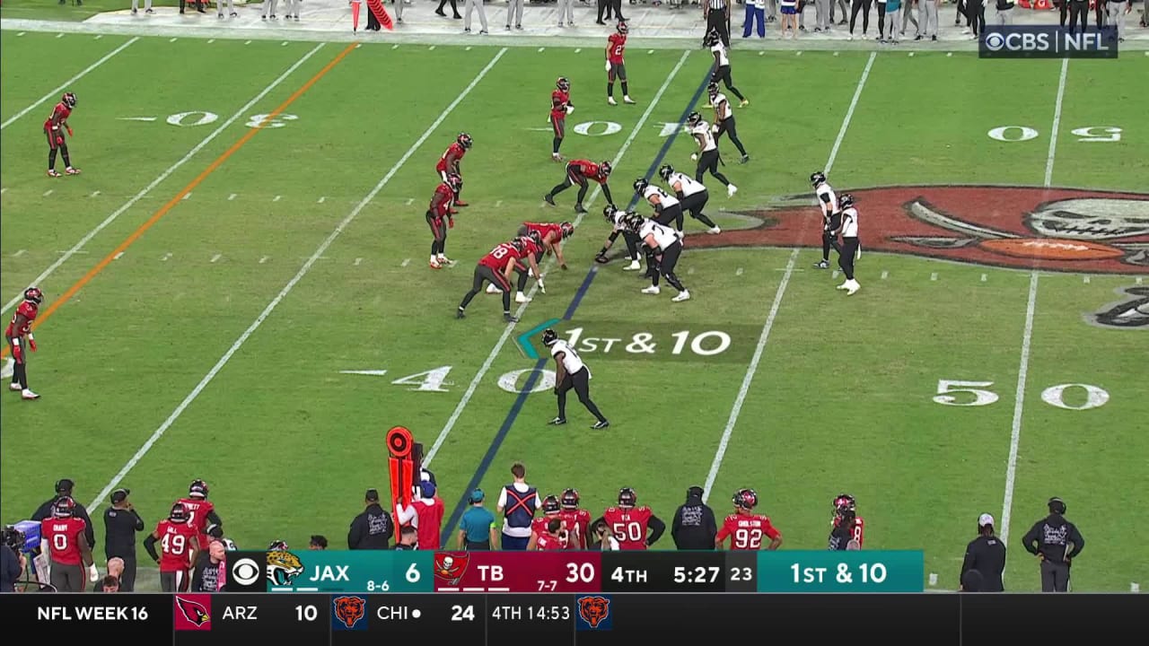 Jacksonville Jaguars backup quarterback C.J. Beathard rolls out to