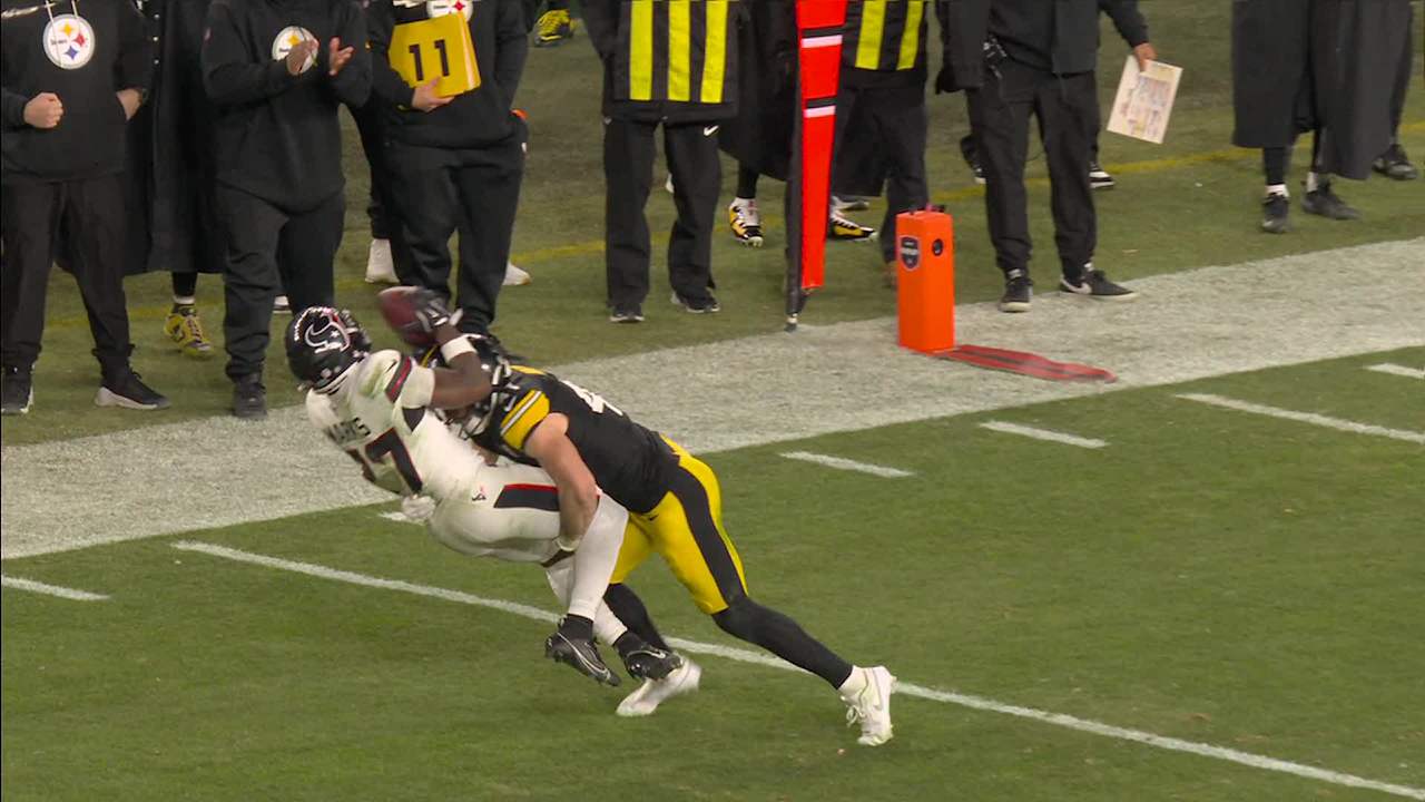 Payton Wilson's strong hit-stick tackle dislodges the football from Marks' grasp