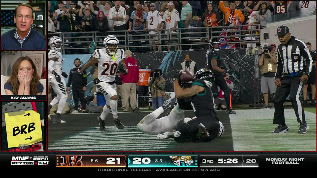 Sports commentator Kay Adams, Peyton and Eli Manning react to ...