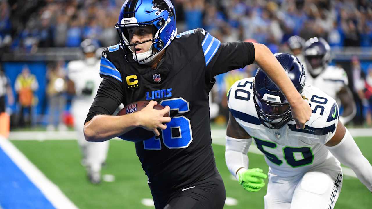 Lions quarterback Jared Goff has a perfect night passing game and records the first TD catch in the win over the Seahawks