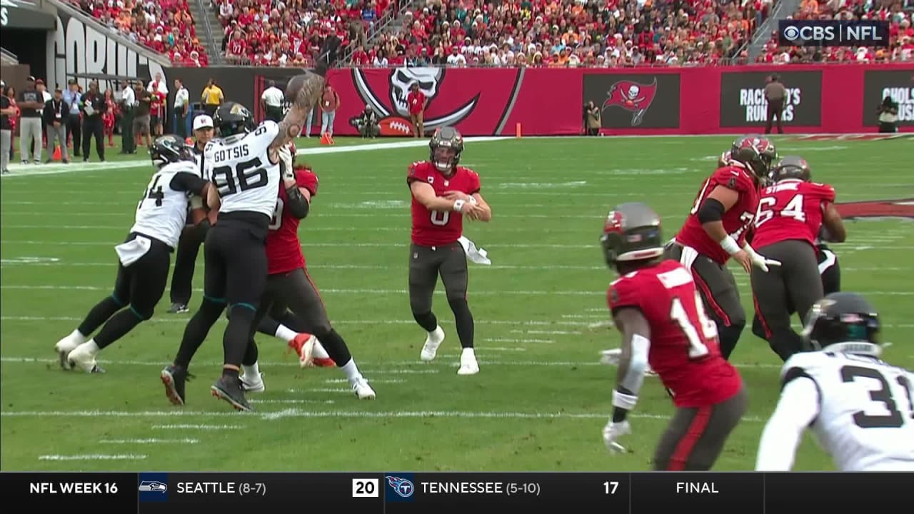 Jacksonville Jaguars defensive end Adam Gotsis bats Tampa Bay Buccaneers quarterback Baker