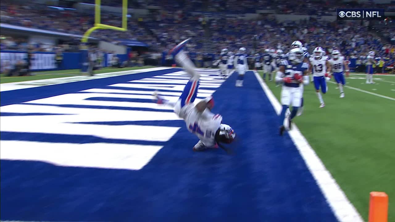 Buffalo Bills running back James Cook flips into the end zone against ...