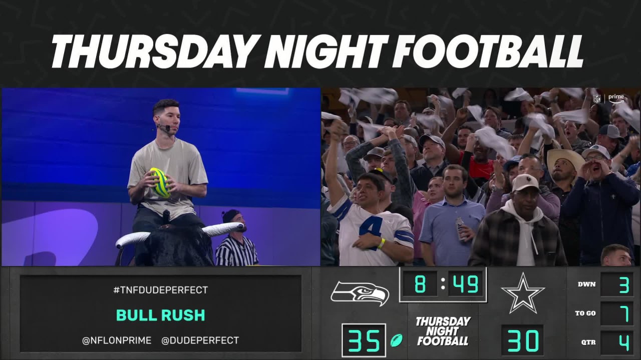 Dude Perfect entertainers Tyler Toney and Cory Cotton play bull rush