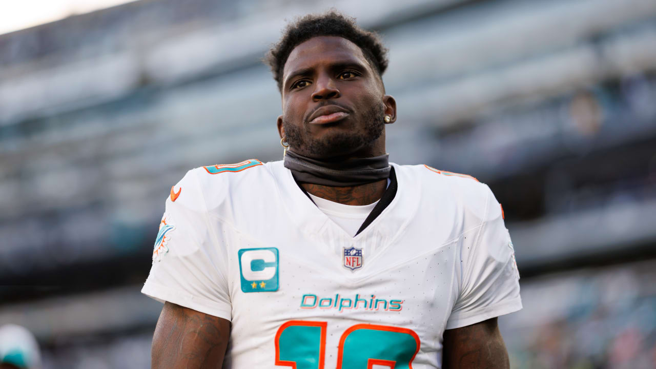 Tyreek Hill was arrested by police for a minor traffic violation before the Dolphins' opener; WR plans to play against Jaguars