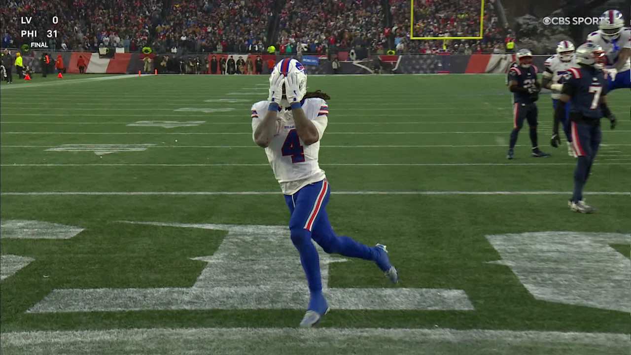 Buffalo Bills running back James Cook slips through the middle on 11 ...