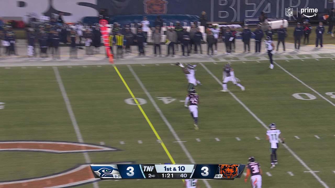 Seattle Seahawks quarterback Geno Smith's rollout results in a 14-yard ...