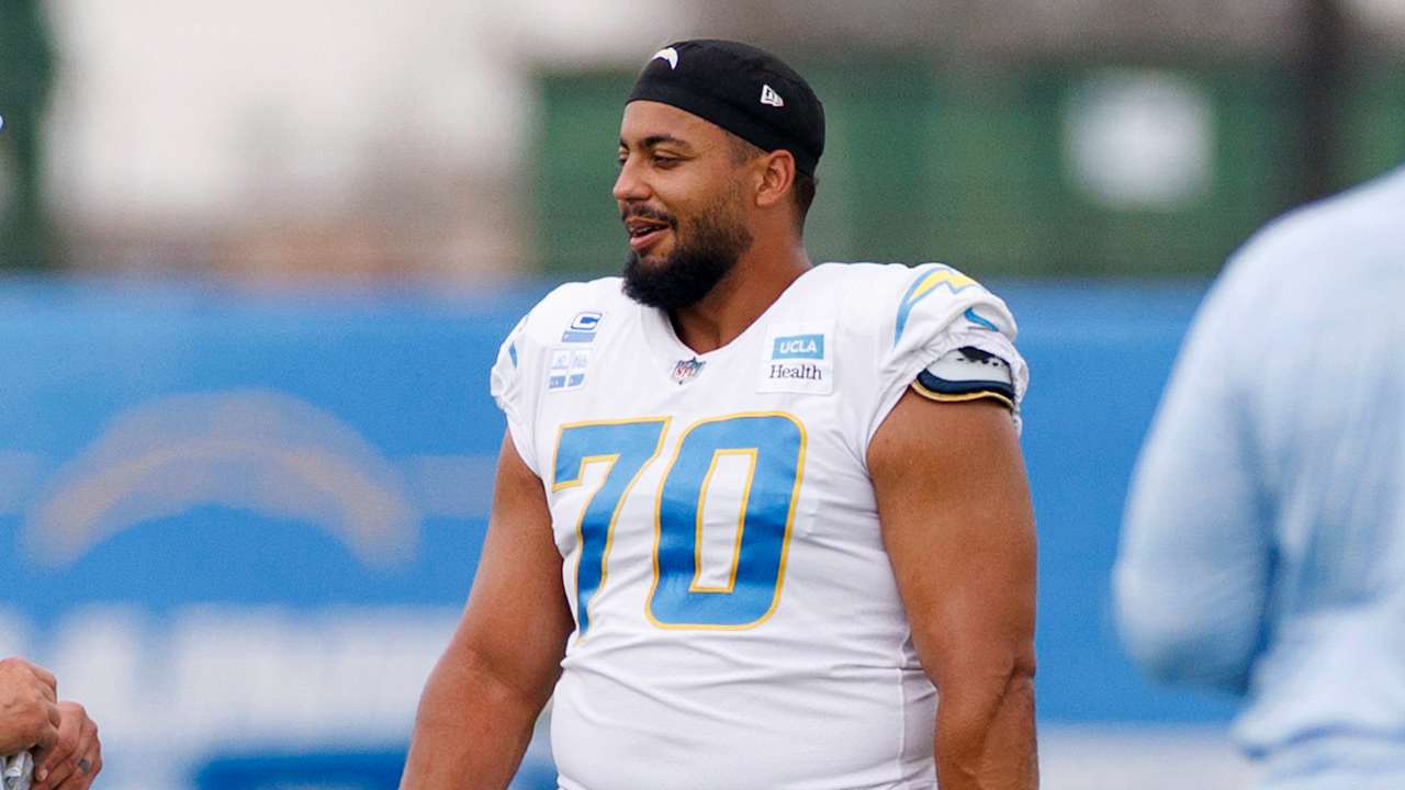 Chargers OT Rashawn Slater carted off practice field with apparent leg injury
