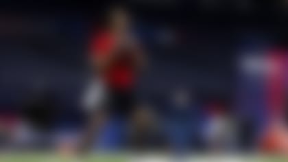 Ohio St. quarterback C.J. Stroud performs a drill at the NFL football scouting combine in Indianapolis, Saturday, March 4, 2023. (Kara Durrette via AP)