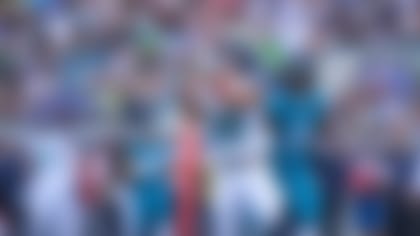 Seattle Seahawks wide receiver Jaxon Smith-Njigba (11) catches a pass for a touchdown during an NFL football game against the Jacksonville Jaguars, Sunday, Oct. 12, 2025, in Jacksonville, Fla. (Paul Abell via AP)